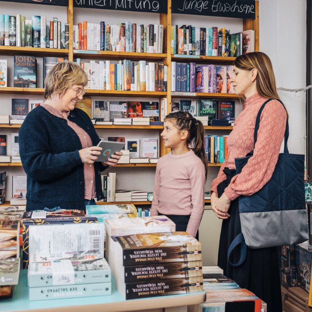 Quimus bookstore Beratungsgespräch in Buchhandlung